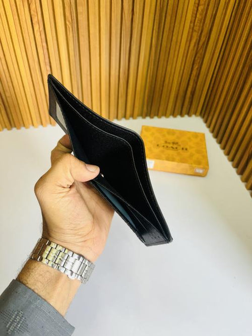 Blipbop 01 Coach premium quality wallet in black leather with multiple card slots and a sleek design.